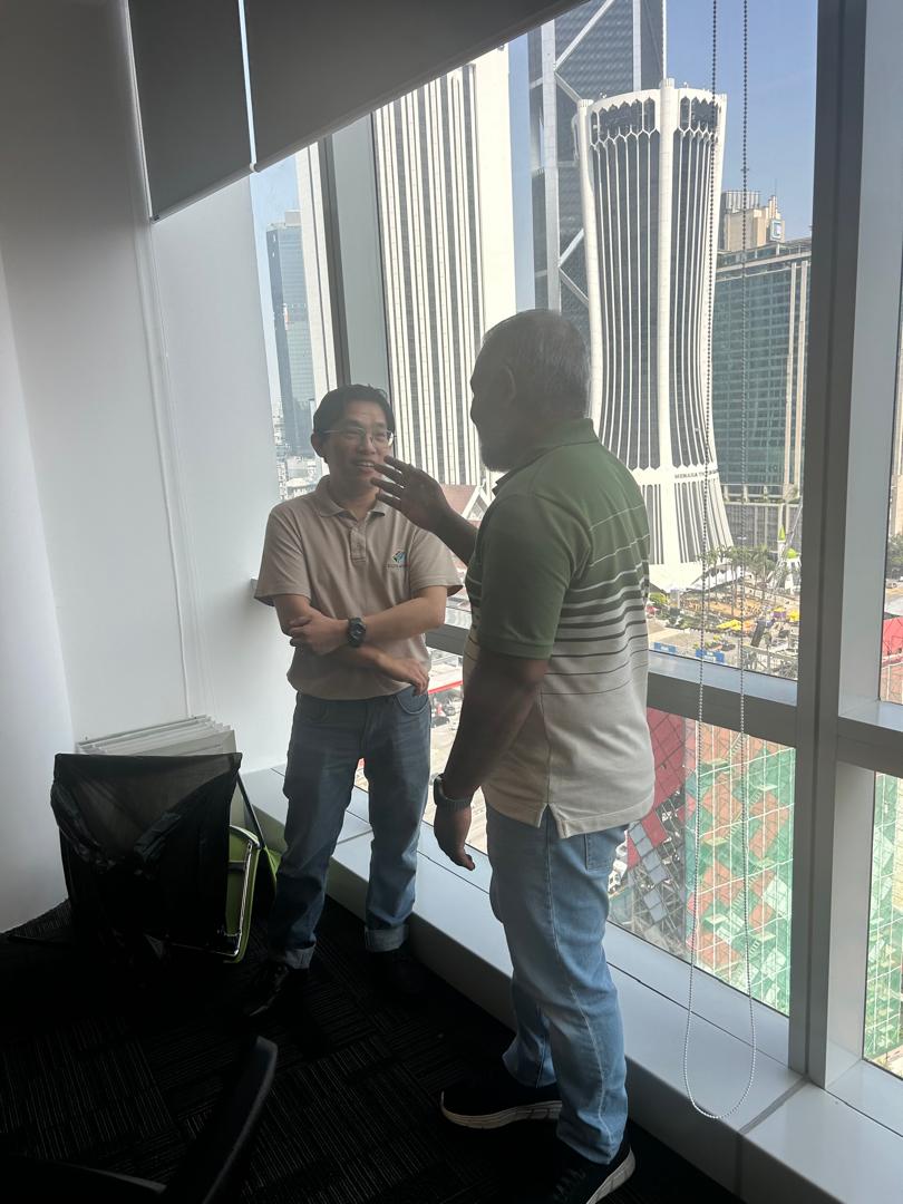 D&B Eid Celebration & Potluck event staff chatting