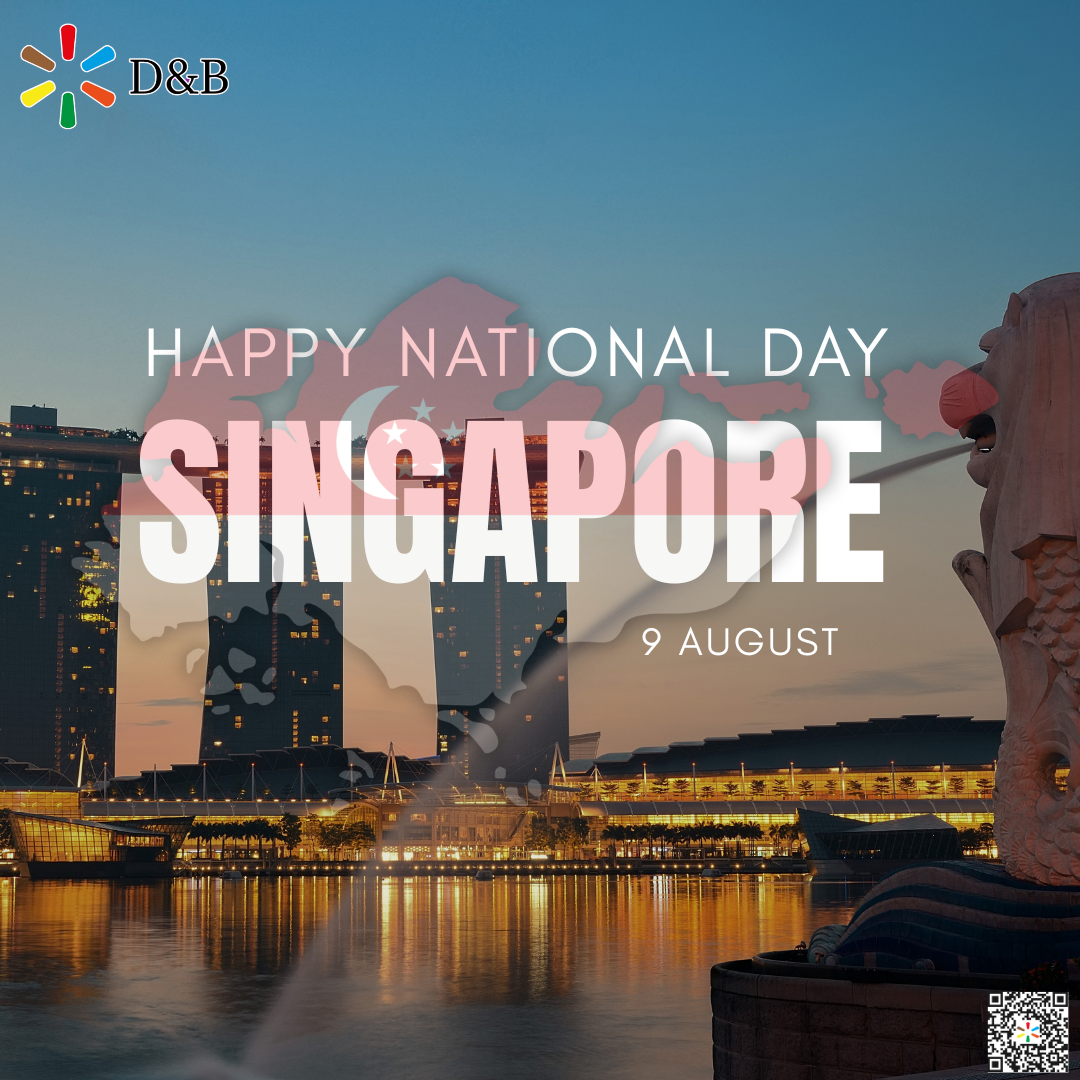 A twilight promotional Graphic featuring Marina Bay Sands and the Merlion statue in Singapore. Superimposed across the center is a map graphic of Singapore styled with the national flag, accompanied by large white text reading "HAPPY NATIONAL DAY SINGAPORE 9 AUGUST". Displays the D&B corporate logo in the top left and a QR code in the bottom right corner.